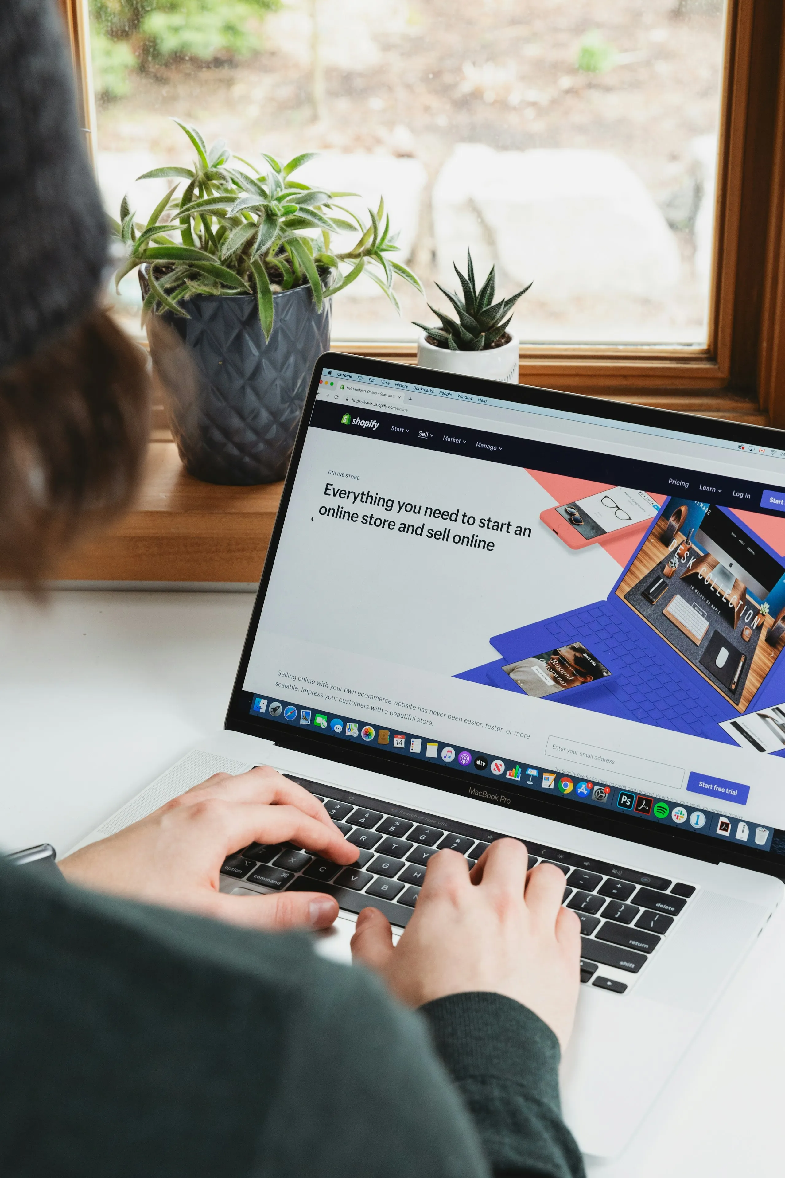 Computer open to a Shopify page